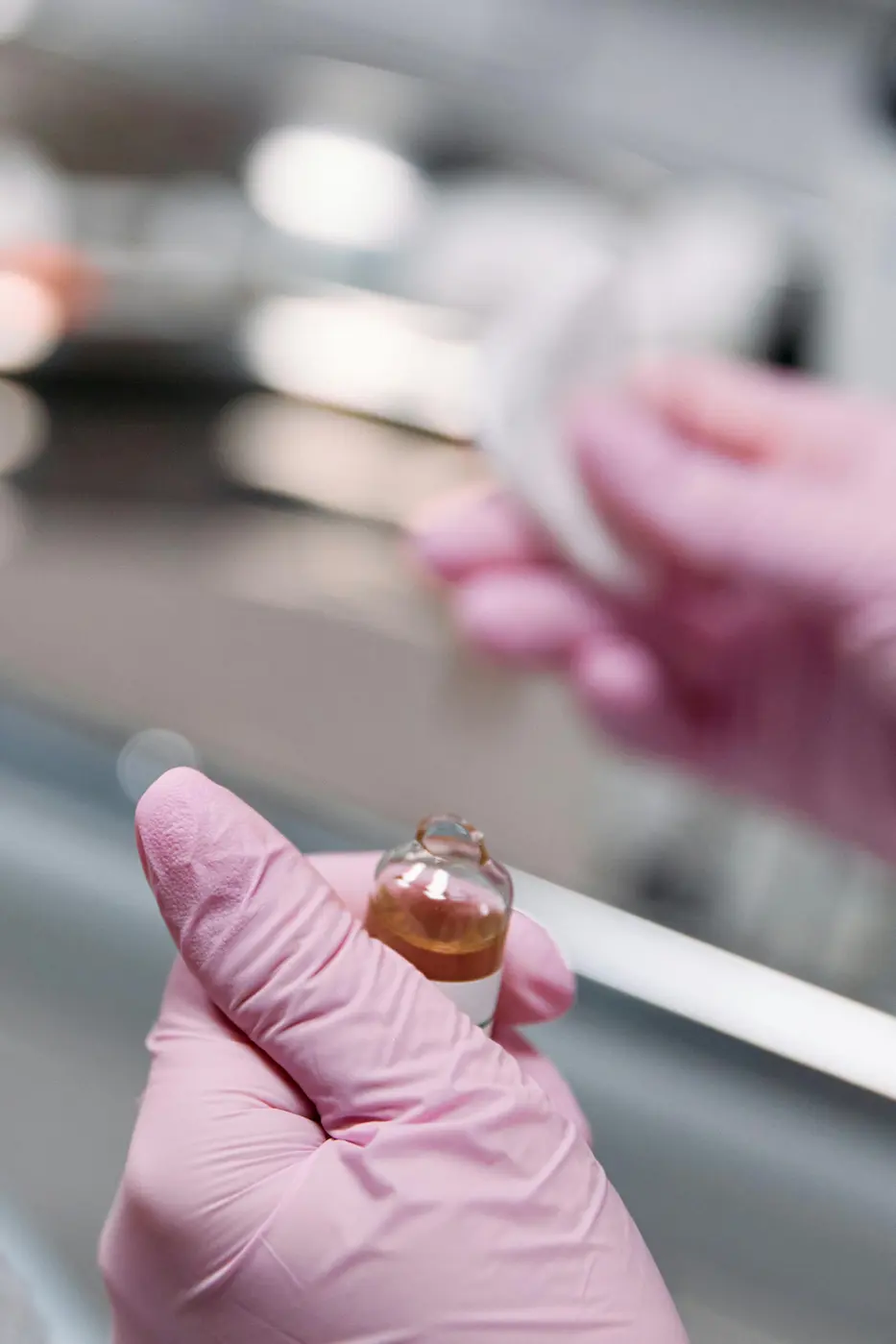 picture of hands holding an ampoule for blog about "full service cro"